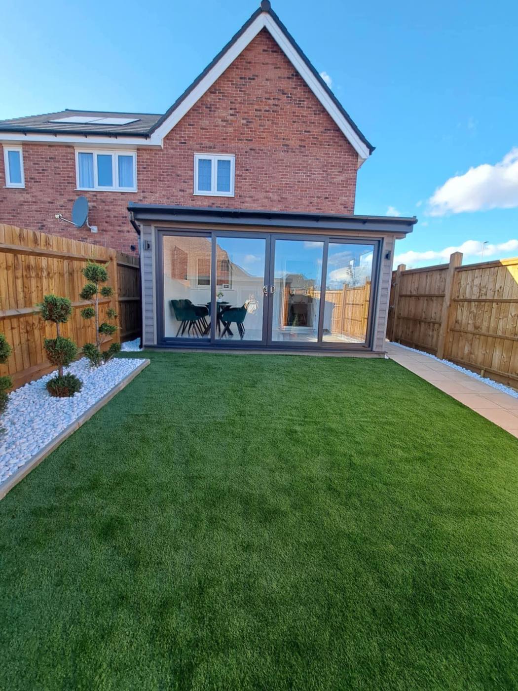 Garden room with new lawn and patio